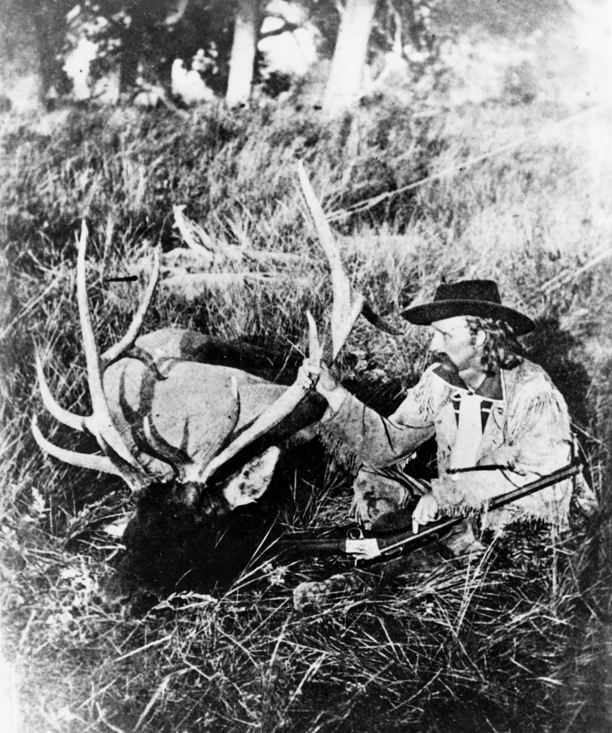 Custer with elk killed on Mussel River in 1873